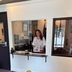 A picture of a staffer in Senator Argall’s Pottsville office assisting a constituent with a Property Tax/Rent Rebate application.