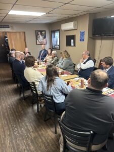 A picture of Senator Dave Argall with a group of local leaders discussing issues affecting Luzerne County.