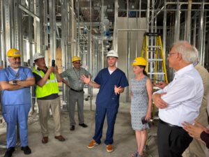 A photo of future students at the Temple Dental Education Center & Clinic as the center is under active construction.