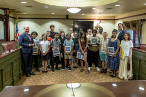 A picture of Sen. Argall with Rep. Tim Twardzik and students from DHH Lengel Middle School.