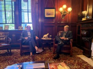 A picture of Senator Argall speaking with Mike Stefan, Vice President of Government Relations for Penn State University, about Penn State Hazleton and Penn State Schuylkill Campus.