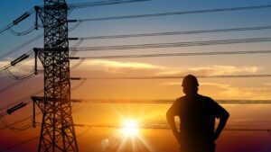 someone looking onward at power lines.