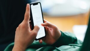A picture of someone using a cell phone.
