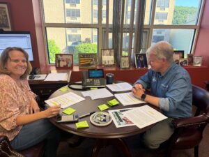 A picture of Sen. Argall participating in his recent Telephone Town Hall with his Chief of Staff, Christine Verdier.