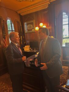 A picture of Senator Argall speaking with Mike O’Sullivan from College Board.