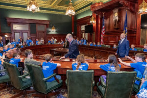A picture of Senator Argall speaking to a group of students from Towamensing Elementary School from Carbon County.