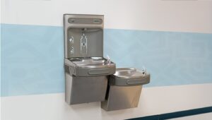 A picture of two water fountains in a school.