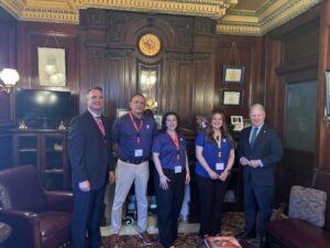 A picture of Senator Argall with representatives from the Greater Wyoming Valley YMCA.