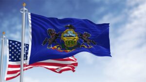 A picture of a US and PA Flag.