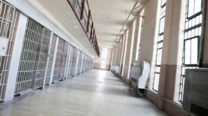 A picture of a prison cell block.