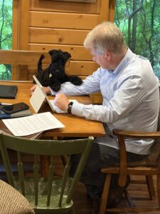 A picture of Senator Argall with his new puppy, Rufus.
