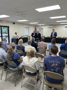 Sen. Argall, Rep. Eddie Day Pashinski, and Rep. Jamie Walsh speaking to constituents.