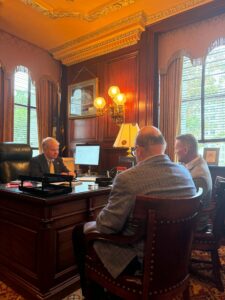A picture of Sen. Argall discussing PA Breweries with representatives from the industry.