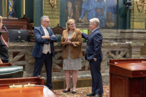 A picture of Sen. Argall and Sen. Tracy Pennycuick welcoming Pastor Nick Pence to the Senate Chamber.