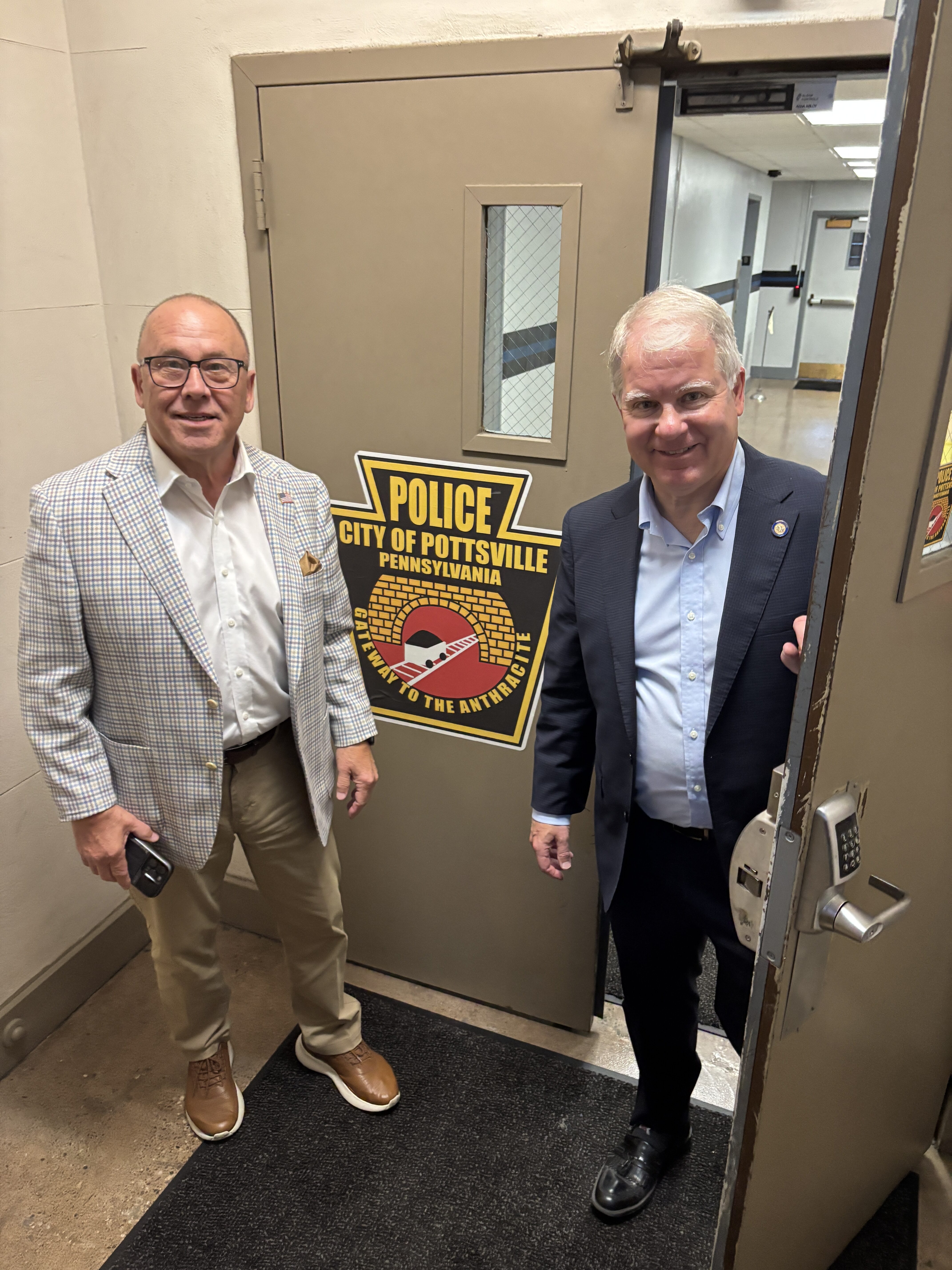 Sen. Argall with Pottsville Mayor Tom Smith touring the Pottsville Police Department.